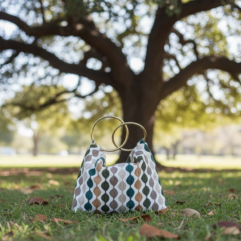 Handtas met messing ringhandvat